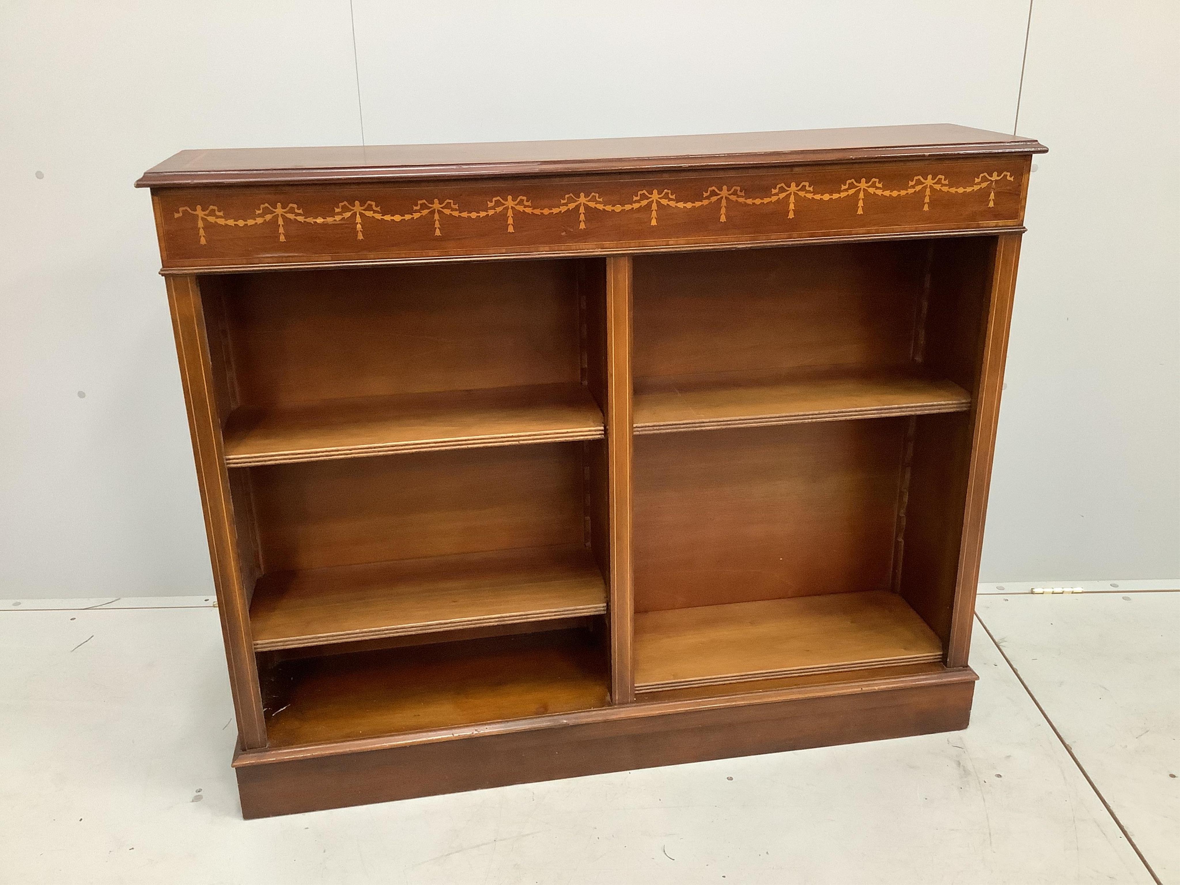 A reproduction Edwardian style inlaid mahogany open bookcase, width 123cm, depth 27cm, height 99cm